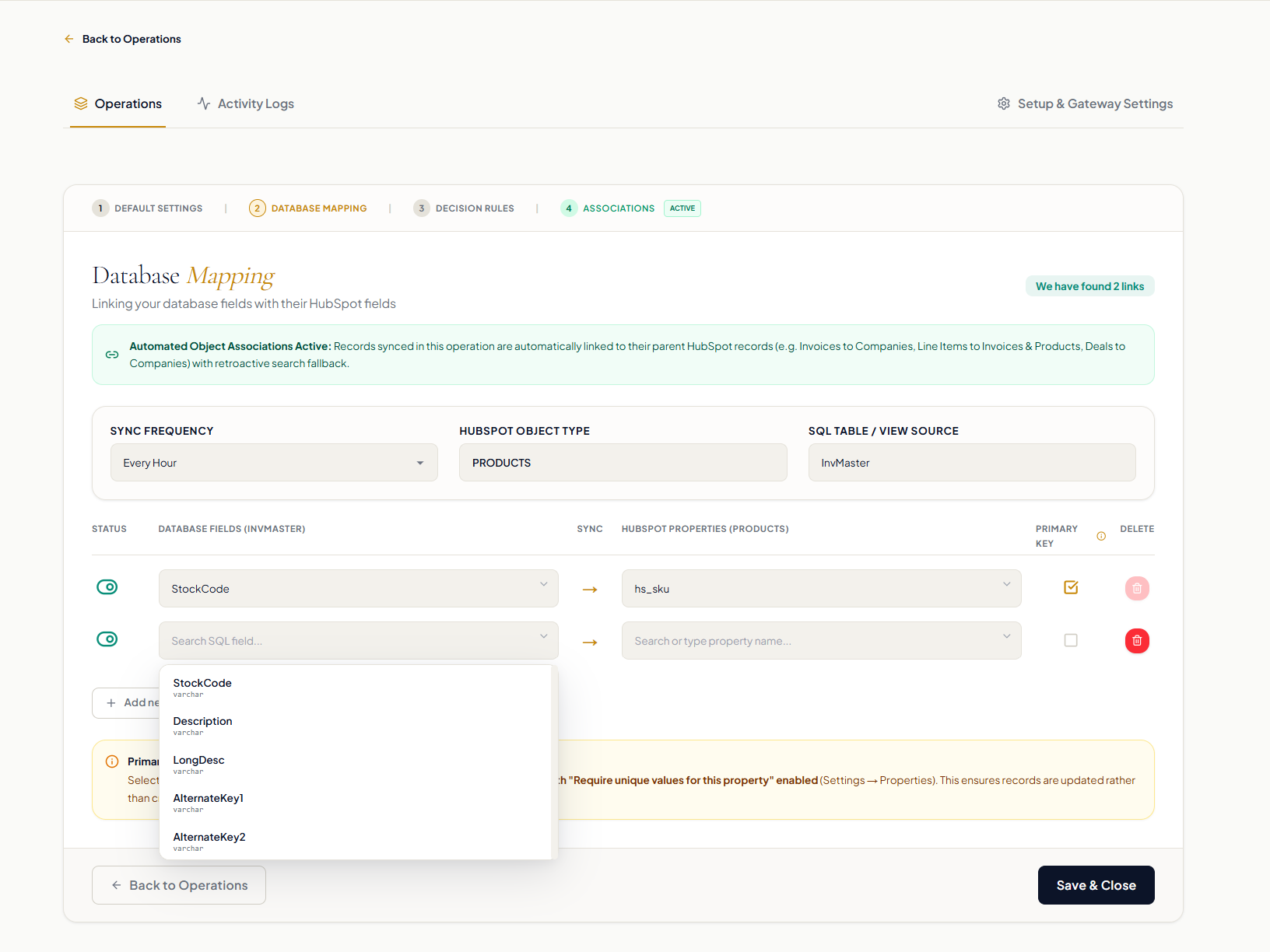 SYSPRO Database Mapping screen mapping InvMaster StockCode to HubSpot Products hs_sku as the primary key, with hourly synchronization and association status.
